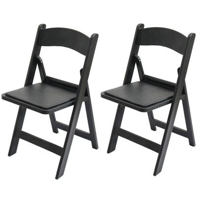 China Portable 450kgs Capacity Black Vinyl Padded Resin Folding Chair For Indoor And Outdoor Events for sale