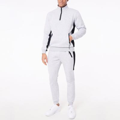 China New diesgn 1/4 zipper breathable funnel neck high quality fleece custom design casual sports tracksuits men empty tracksuits for sale