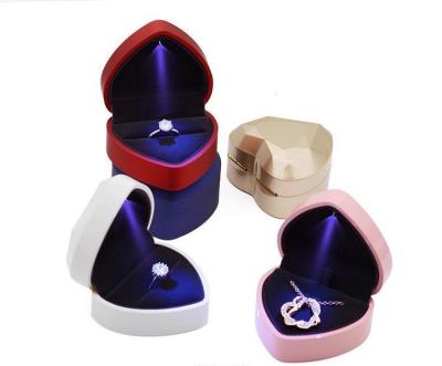 China China Direct Factory Romantic Diamond Velvet Heart Box Luxury Plastic Wedding Packaging Ring Box With Light for sale