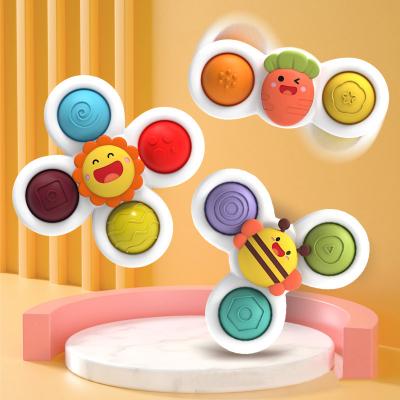 China Toy Spinning Top Swimming Cognitive Floating Bath Toys for Children Cartoon Flower Wriggly Gyro Spinner Children Develop Baby Rattle Educational Toy for sale