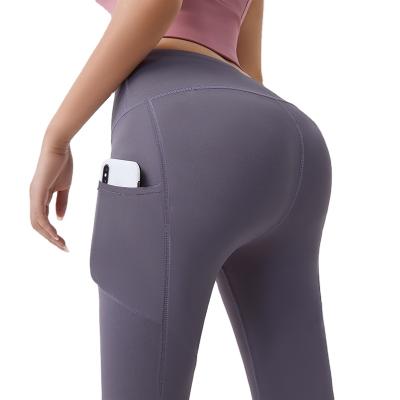 China Women Breathable Customizable Elasticity Gym Leggings Outdoor Fitness Plus Size Yoga Pants With Pocket for sale