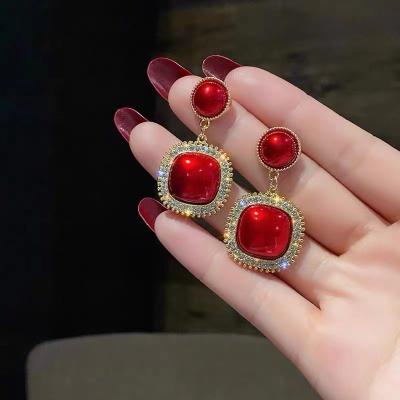 China Round Square Diamond Pearl Earrings S925 Needle Pearl Geometric Inlay Silver Red Dangle Environmentally Friendly Earrings For Women for sale