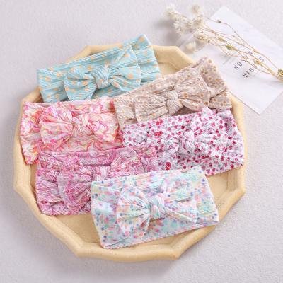 China New arrival European and American jacquard flank baby bow baby nylon headband set friendly material for sale