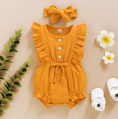 China Romper Friendly Material Babies and Headband Cotton Canvas Ruffles Sleeveless Infant Rompers Newborn Baby Rompers for sale