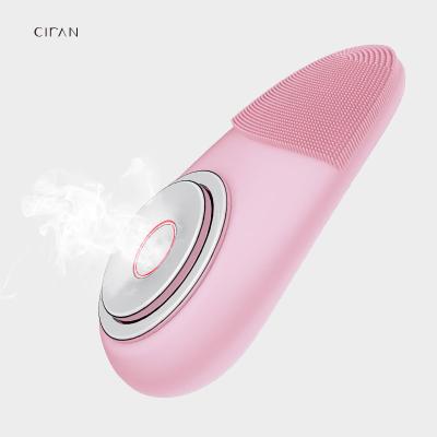 China Acne Treatment IPX7 Heating Sonic Silicone Brush Face Remover Skin Care Device Electric Facial Cleansing Warm Vibrating Soft Exfoliation for sale