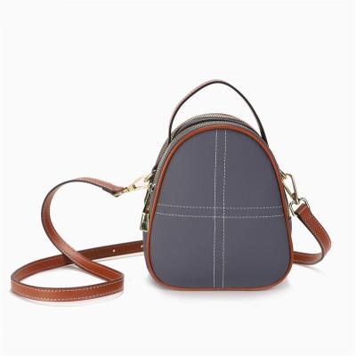 China Yuhong Waterproof High-end Small Handbag For Woman Phone Bag Trend Cute Round Cross 2023 New - Body Purse PU Leather Handbag for sale