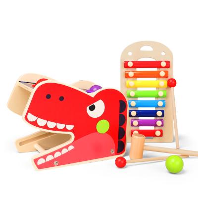 China Wooden Early Education Learning Trrannosaurus Rex Music Book Gifts Christmas Birthday Knocking Pianl Toys For Children Kids for sale