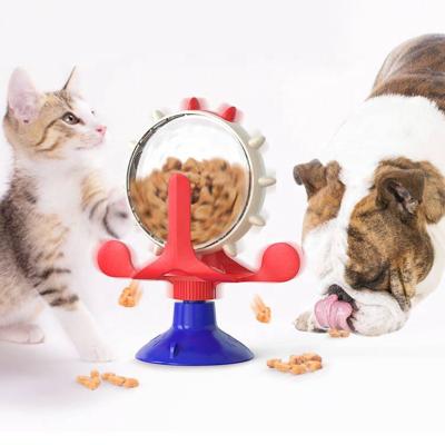 China 2021 Hot Selling Automatic Cat Turning Windmill Slow Food Trainer Pet Food Machine Pet Feeder for sale