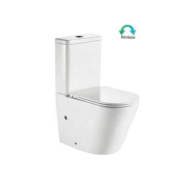 China Chinese Rimless Ceramic Color Rimless Double-Flow Floor Standing White Bathroom Round Two Pieces Toilet for sale