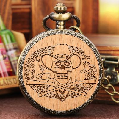 China Quartz Watch With Necklace Chain Cheap Gift Clock Pendant Wood Carved Head Skull Gun Western Vintage Cowboy Design Outlaw Brass Quartz Pocket Watch With Chain for sale