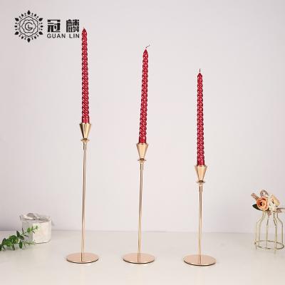 China Nordic Modern Reusable Table Gold Cone Candle Holders Wedding Decorative Metal Gold Candle Holder for sale