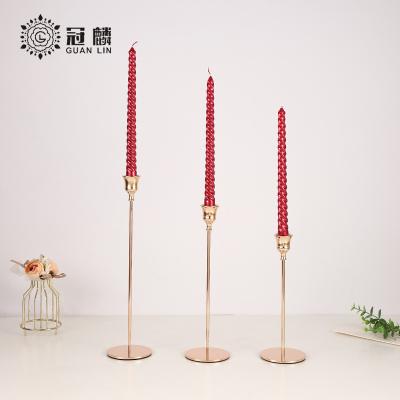 China Luxury Reusable Metal Nordic Modern Decorative Gold Wedding Stick Gold Wine Glass Candlestick Holder for sale