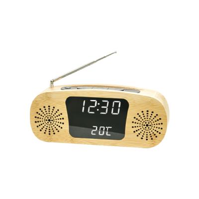 China 2020 New Design Classic Style Radio Led Temperature Digital Pendulum Relogio AM Fm Radio Clock Radio for sale