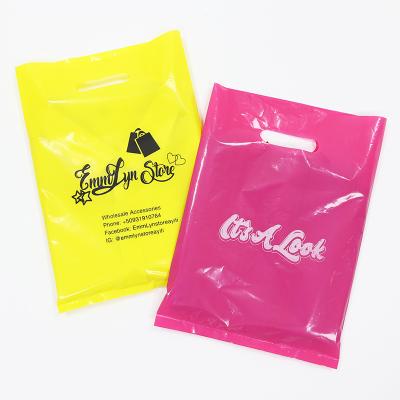 China Recyclable Die Cut Handle Bag Printed Logo PE Plastic Shopping Bag For Cloth Packaging for sale