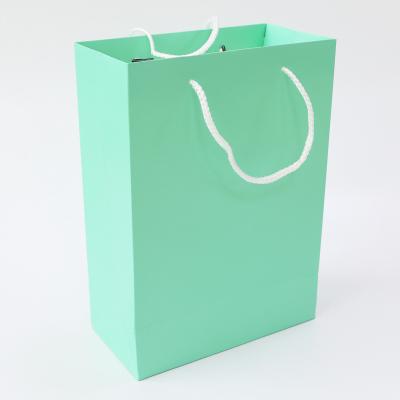 China Recycled Materials Wholesale Clothing Paper Bag Printing Custom Blue Sky Jewelry Gift Bag Packaging Custom Size for sale