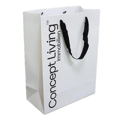 China Recyclable Printed Food Kraft Paper Bags With Handle , Custom White Paper Bag For Clothing for sale