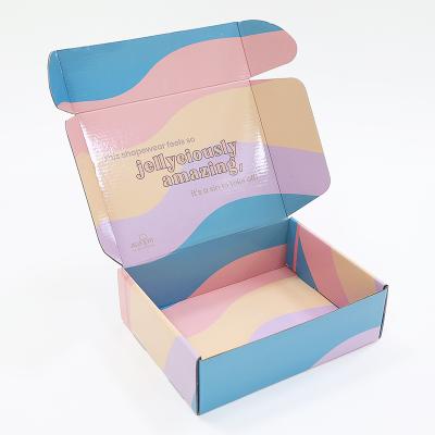 China Custom Materials Glossy Surface Design Recycled Corrugated Cardboard Clothing Crushproof Paper Boxes for sale