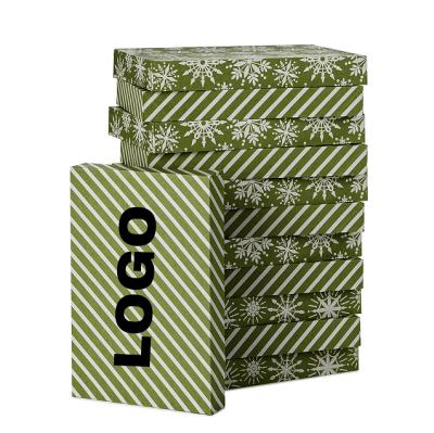 China Recycled Materials Custom White Snow Flakes Paper Boxes For Christmas Apparel Kraft Paper Packaging Box for sale