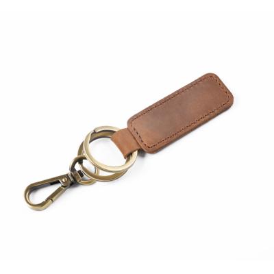 China Office/School/Advertising/Cheap Price China Factory Gift Easy To Carry Leather Key Chains With Metal Ring for sale