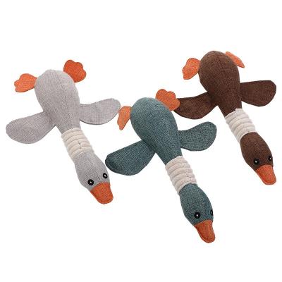 China New Pet Goose Teeth Relief Dog Toy Grinding Healthy Squeaky Toy Wild Viable Plush Toy for sale