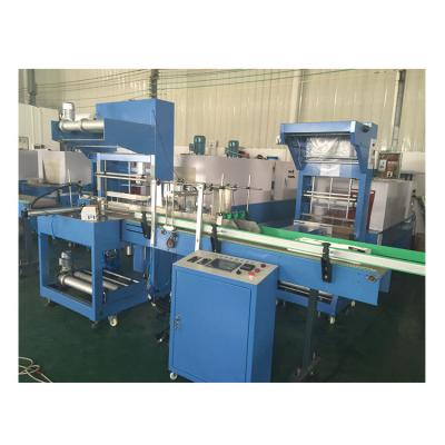 China Plastic Wrapping Machine Automatic Food Packing Machine Water Bottle PE Film Heat Shrink Wrapping Machine for sale