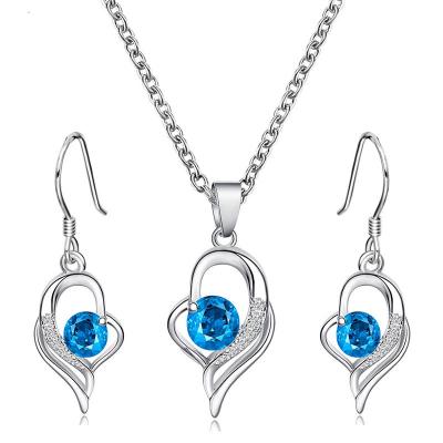 China Korean Wholesale Hot Selling Classic Set Silver Plated Diamond Love Necklace Blue Chain Conch Cross Necklace and Earrings for sale