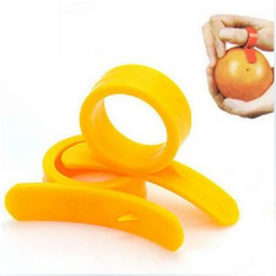 China 1000pcs Sustainable Kitchen Instruments Cooking Open Finger Type Orange Peeler Peeler Parer Finger Device for sale