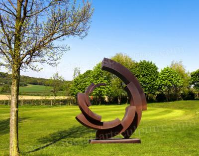 China Estatua de acero de Corten de la forma redonda oxidada del círculo como ornamento al aire libre del césped en venta