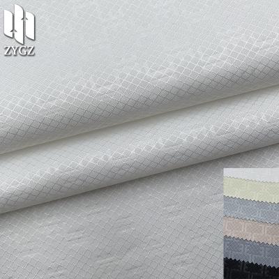 China Flame retardant artificial leather pleating process: 100% polyester laminated fabric, luggage and shoe material for sale