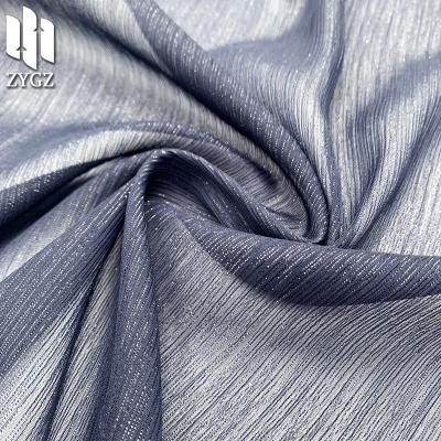 China QUICK DRY Polyester Chiffon Luminous Silk Tulle Instant Fabric Dress Women's Clothing Performance Dress Fabric for sale