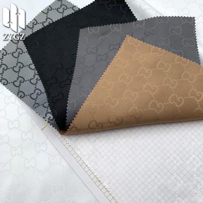 China Wind Proof 100% Polyester Fashion Jacquard Fabric Clothing Coat Cloth Anti-Static Bag Scratching Wholesale for sale