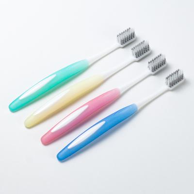 China Conical Teeth Cleaning Brush Family Pack Toothbrush Charcoal Spiral Home Double Stiffens Adult Toothbrush for sale