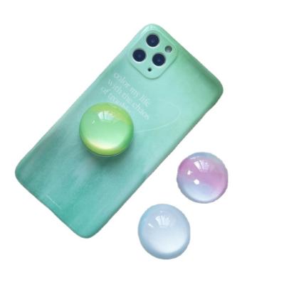 China Epoxy Resin Shockproof Universal Ball Mobile Phone Bracket Lollipop Factory Mobile Phone Airbag Foldable Holder for sale