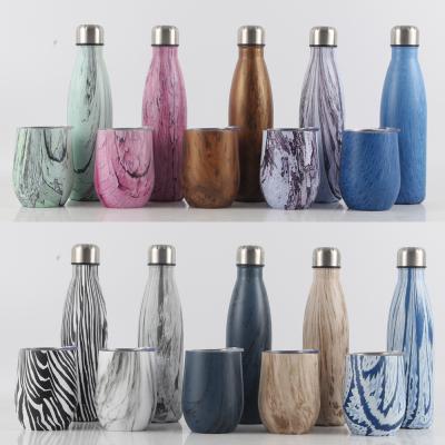 China Madou Eco Friendly Vacuum Sport Double Wall Stainless Steel Cola Shape Viable Thermo Drink Insulated Water Bottles With Custom Logo for sale