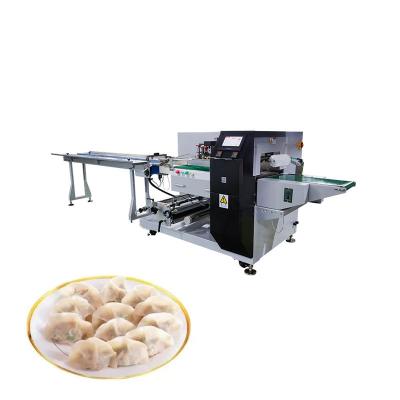 China Automatic Frozen Dumplings Pillow Packaging Machine Food Processing Factory Special Packaging Machine WL-420 for sale