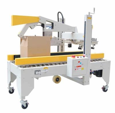 China FX-6050 Auto Carton Sealer Machine 220V / 50Hz Power Supply For Food Beverage for sale