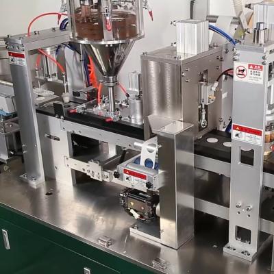 China Advanced Coffee Capsule Filling Sealing Machine for Vertical Capsules Loading Station for sale