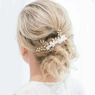 China Brass+rhinestone white flower fancy high quality small pearl bridal hair comb hair accessories for wedding for sale