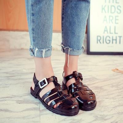 China Other Fashion 2021 By Luminous Clasp Flat Crystal Roman Sandal T Flat Crystal Roman Sandal Glitter Shine Jelly Shoes Beach Plastic Shoes for sale