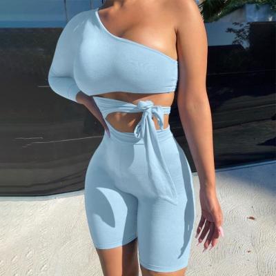 China wholesale Anti-wrinkle yoga set 2022 new solid women crop top one shoulder hollow out shorts two piece set for sale