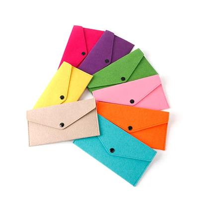 China Environmentally friendly and durable hot sale minimalist design of customizable style mini portable environment friendly color felt phone wallet for sale