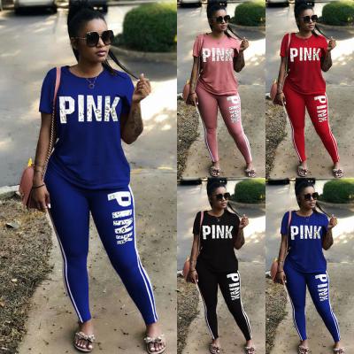 China C105-2 QUICK DRY fabric casual joggers pink letter 2 piece set sportswear causual skinny pants sets tracksuits for women for sale