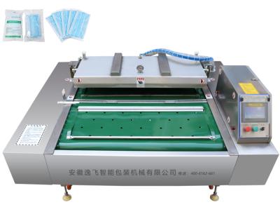 China Surgical Vacuum Mask Caps Continuous Vacuum Machine Vacuum Packing Gloves Food Sealer for sale