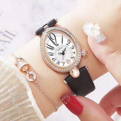 China Water Resistant Women's Simple Watches Oval Quartz Watch Create Your Own Logo With Leather Chronograph Watch for sale