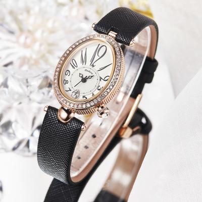 China Luxury Water Resistant Rhinestones Alloy Lady Watches Waterproof Quartz Watch Custom Brand Your Own Logo Watch for sale