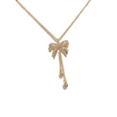 China FASHIONABLE Lightweight Luxury Niche Accessories Fashion Design Clavicle Chain Micro Inset Zircon Bow Tassel Necklace for sale