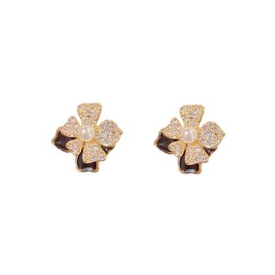 China TRENDY Micro-Inset Zircon Flowers Small Delicate Fashion All With Light Luxury Niche S925 Silver Needle Earrings for sale