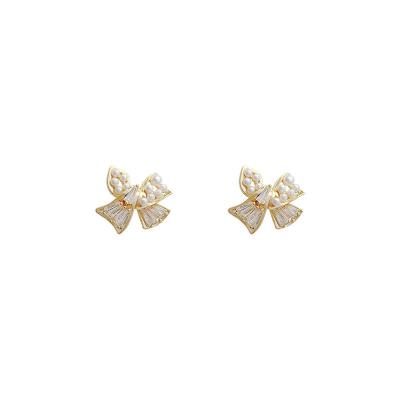 China Trendy 2023 Personality Fashion Simple Earrings Bead Compact Silver Zircon Bow S925 Needle Earrings for sale