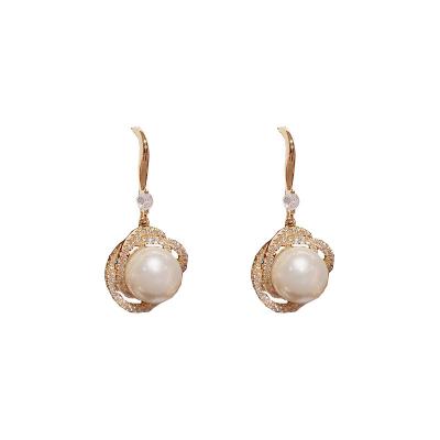 China New Zircon Micro-inset Zircon Winding Pearl Niche Female Earrings FASHIONABLE Retro Earrings Temperament Girl for sale