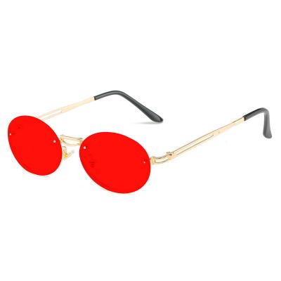 China Fashion Sunglasses 2022 Sunglasses for Women Summer Cut-edge Fashion Luxury Oval Gold Frame Rimless Glass Shade Pink Women's UV400 Sun Glasses for sale